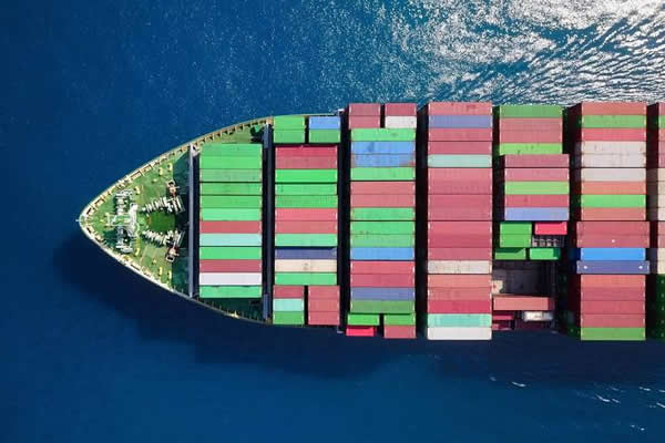 Aerial view of cargo ship at sea